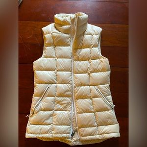 Never worn - sleeveless puff jacket by REI